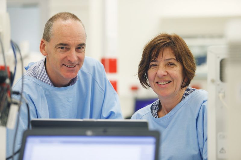 Dr Mike Catton and Scientist Renata Kostecki smile for a photo.