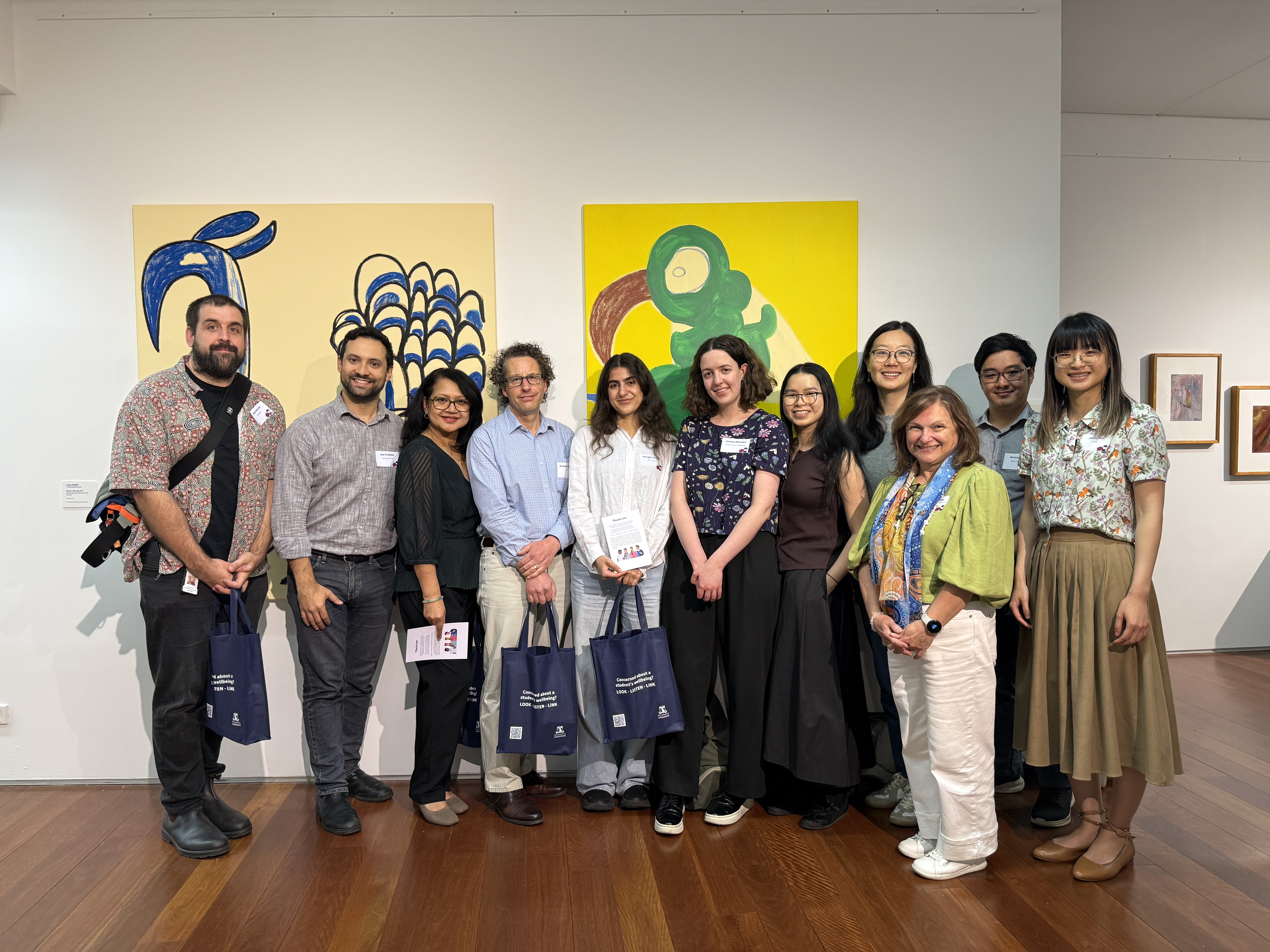 group photo of all the supervisors with gift bags