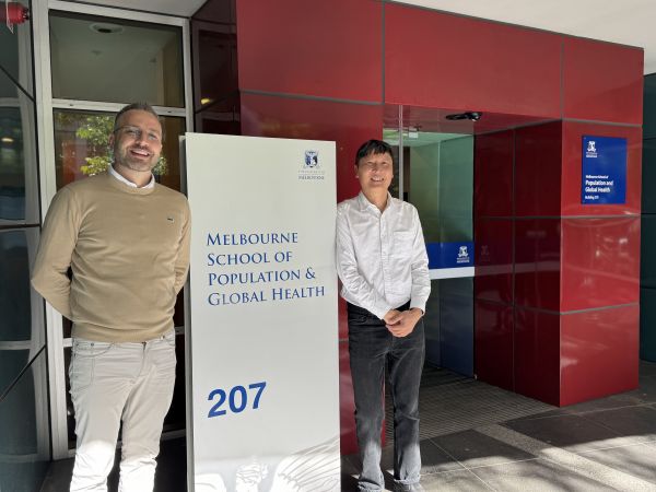 Associate Professor Antonio Celentano and Associate Professor Fabian Kong outside the Melbourne School of Population and Global Health