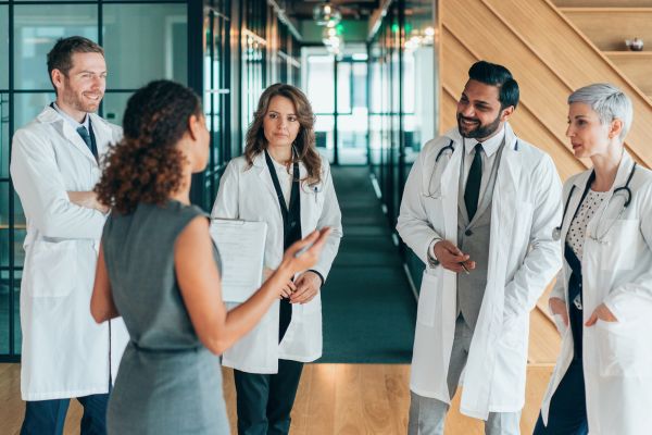 Group of clinicians talking 