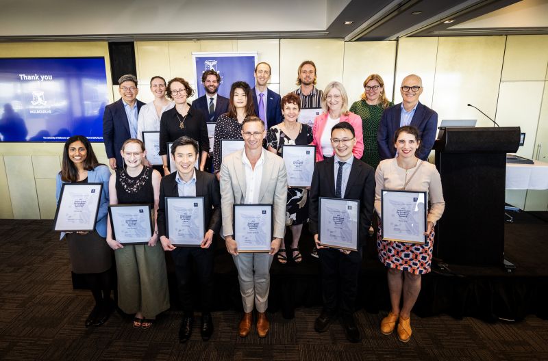 Awardees of the Dean's Awards for Graduate Researchers holding their awards, with Professor Jane Gunn AO, Professor Mike McGuckin and Professor Justine Mintern Awardees of the Dean's Awards for Graduate Researchers holding their awards, with Professor Jane Gunn AO, Professor Mike McGuckin and Professor Justine Mintern