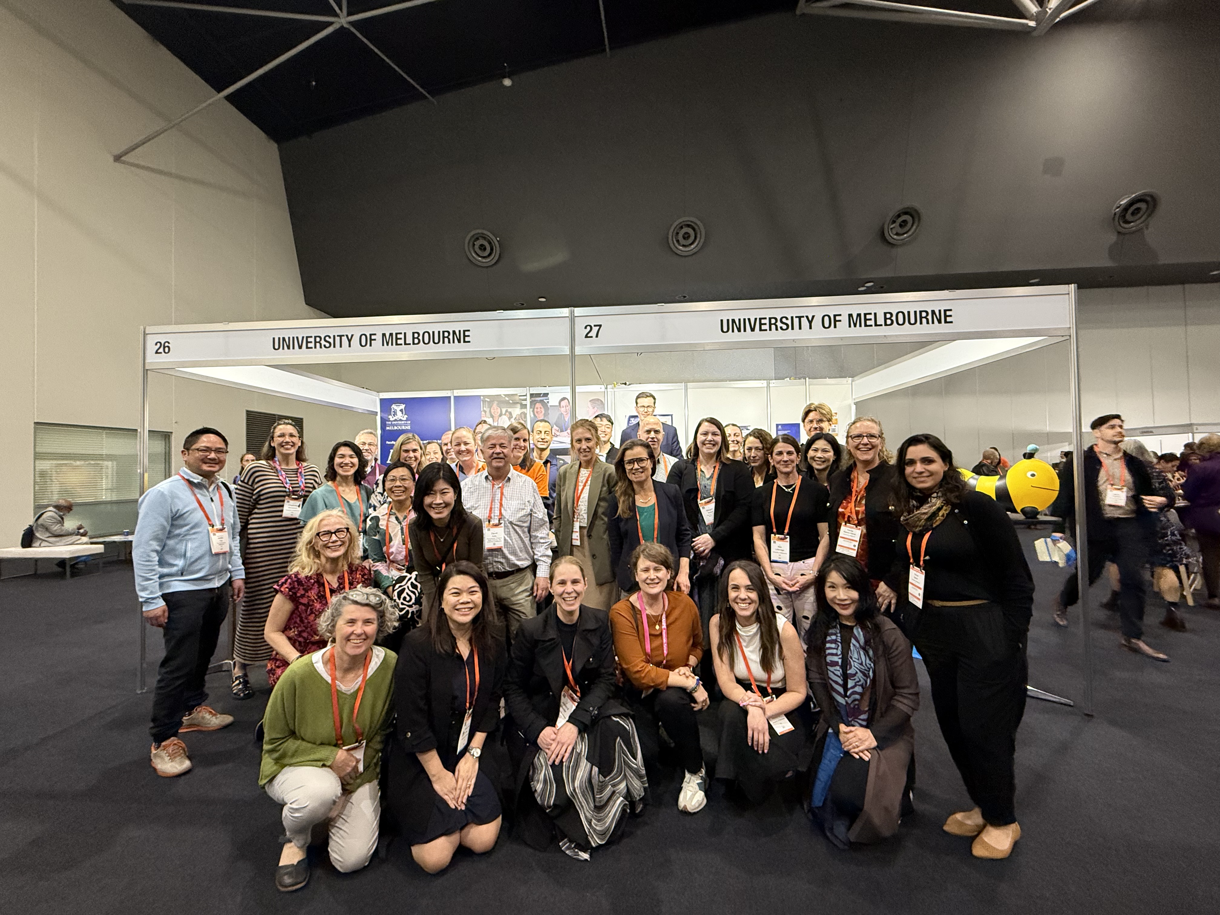 group photos of UoM staff at the conference