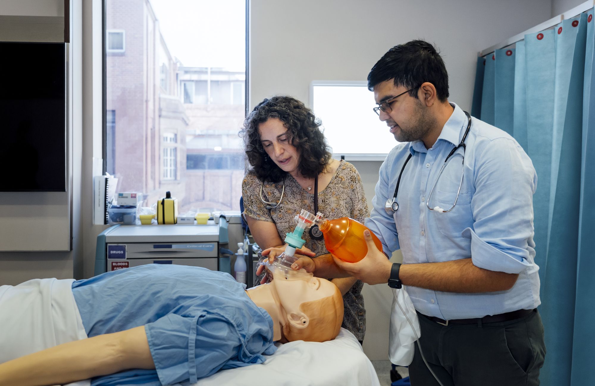 Dr Christine Sammartino and student Farhan Islam practice..