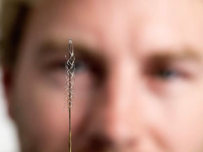 A closeup of the Stentrode - a tiny brain implant device that looks like a coil of wires.