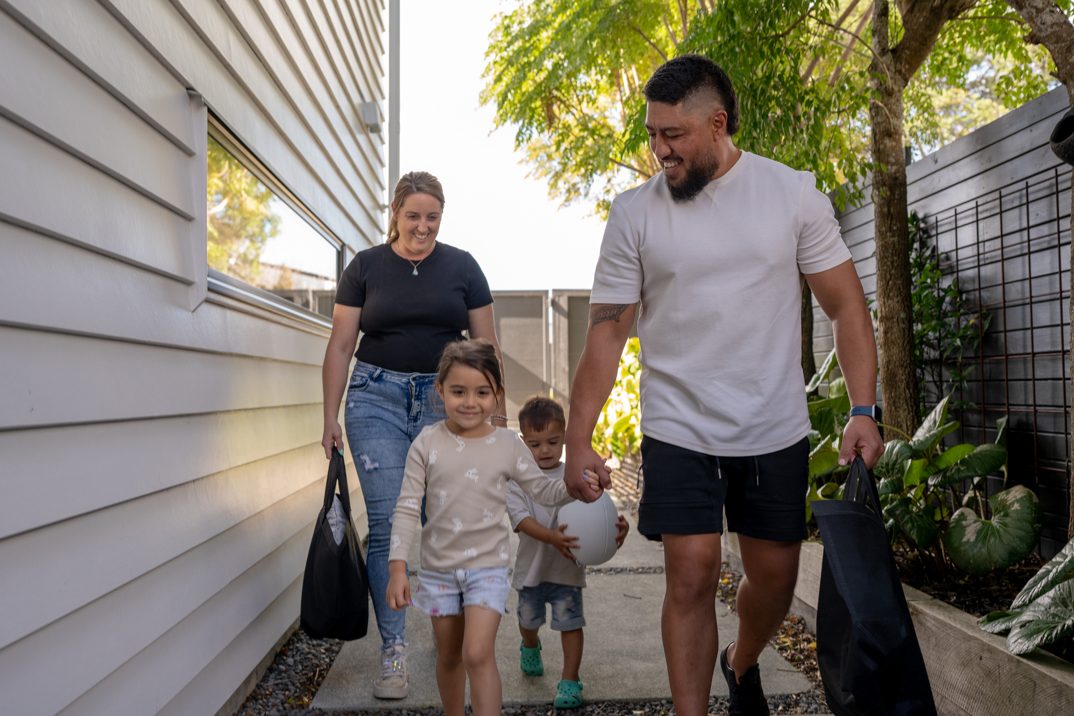 Happy family coming home