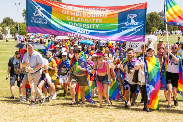 Hundreds of University staff and students in pride flags at Midsumma Festival