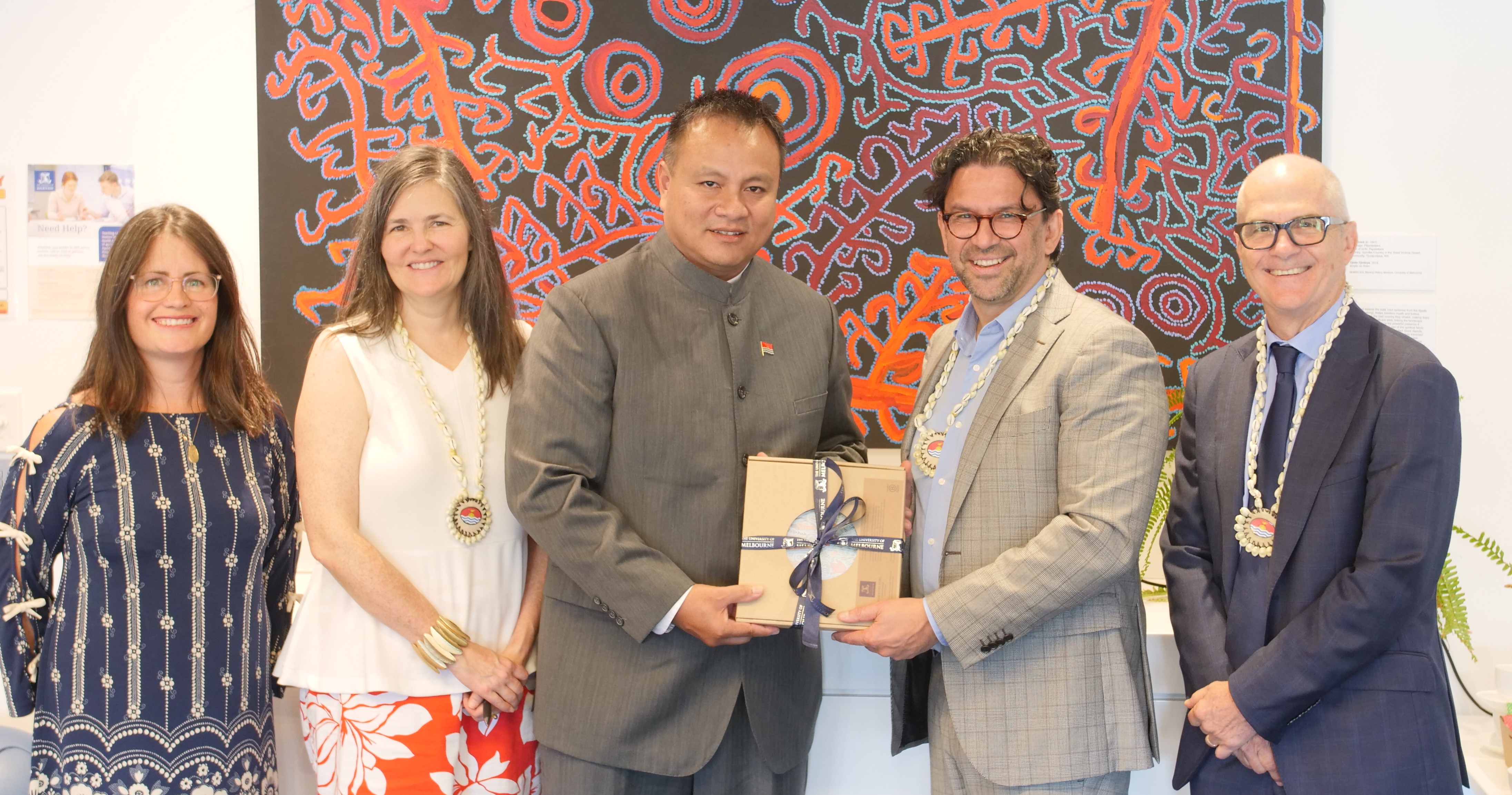 Giving a gift at the signing of the Memorandum of Understanding between the government of Kiribati and the University of Melbourne.