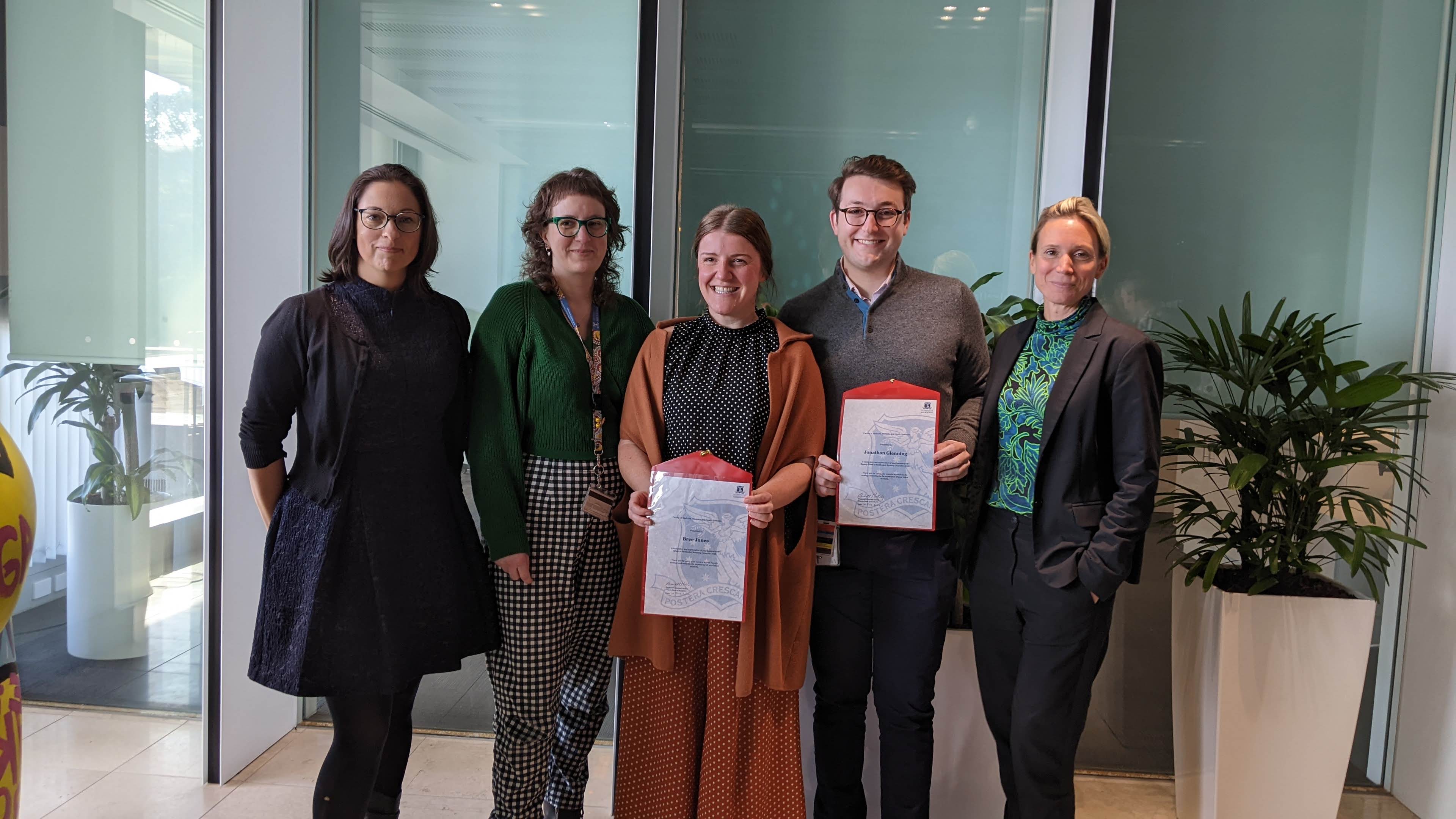 Abi Brooker, Academic Director of Student Experience, Manager Student Experience, Alice Reid, Student Advisory Committee members Bree Jones and Jonathan Glenning, Associate Dean Teaching and Learning, Professor Liz Molloy. Student Advisory Committee group photo. Student representatives of the inaugural committee Bree Jones and Jonathan Glenning holding a certificate of recognition.